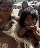 A mother and her child attend the press conference and protest on May 6, 2013 against a ban on the entry of lawyers and journalists at the occupation of Belo Monte.