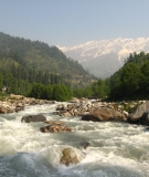 The Beas river characteristically has protruding boulders accessible from the riverbank