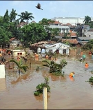 Rescue efforts near Jakarta are difficult in the thick mud