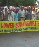 Activists protest outside the public consultation