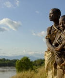 Three Generations of Women Looking Out Over the Omo River