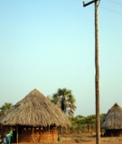 Electricity passes over a village resettled for Kariba Dam, Zimbabwe
