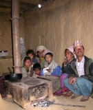 Family with an Electric Light Bulb in rural Nepal. (Alex Zahnd)