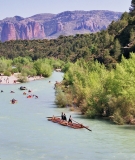 Kayakers enjoy the beautiful Gallego River