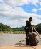  Shan soldiers patrol the Salween River as plans for a series of hydropower projects threaten to swallow up thousands of acres of land, jeopardizing the return of ethnic minority refugees.