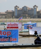 Thai activists and villagers who are affected by the controversial Xayaburi dam protest with banners on the Mekong river in Nong Khai province, Thailand, in November 2012.