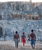 Indigenous Munduruku men survey the quarry site for the Belo Monte dam.