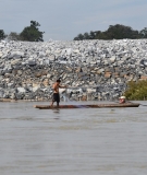 A fisherman in front of the Don Sahong cofferdam in Laos.