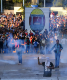 Students clash with riot police Thursday during a protest in Tegucigalpa against the murder of indigenous activist Berta Cáceres.