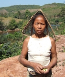 A villager on the Nam Tha River, which CSG plans to dam