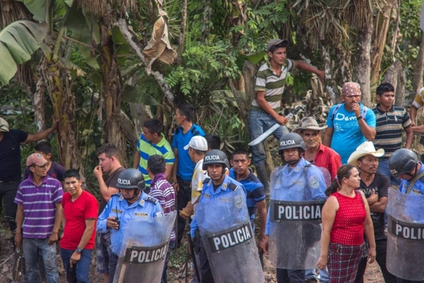 Honduran police at a COPINH event.