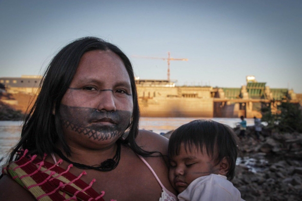 A Munduruku warrior and child.