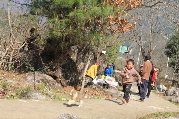 Nu child playing in a village along the Nu-Salween River