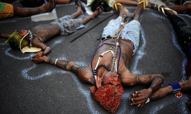 Munduruku people from the Amazon basin protest against construction of river dams near their land, including the controversial Belo Monte power plant that began operating this week. 