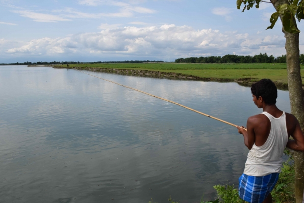 Fishing along the Teesta River.