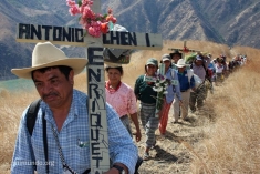 Carlos Chen Osorio leads a procession to remember victims of the Chixoy Dam massacres.