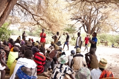 Ikal speaking to a community near Lake Turkana