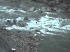 A blurry still from the video that captured the Larji dam tragedy