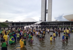 Demonstrators protest against corruption in front of Brazilian Congress on Sunday