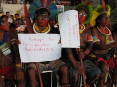 Kayapó with homemade anti-dam signs