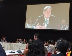 Jorg Frieden speaking at board roundtable in Lima