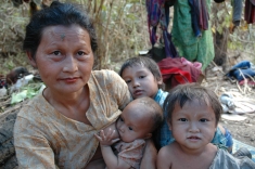 A Karen displaced family fleeing armed conflict in a temporary shelter on the bank of the Salween River, near a proposed dam site on the Salween