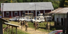 Police in Chadong village as part of the forced verification order
