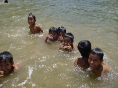 Children enjoying the waters of the Rio Negro