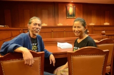 Niwat Roykaew and Mrs. Sorn Champadok inside the courtroom