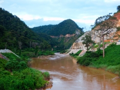The Xekaman 1 Dam in southern Laos is under construction. Displaced villagers are living in temporary relocation zones for over a decade, without due compensation and housing support.