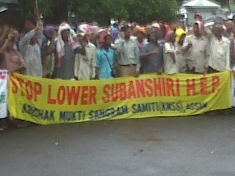 Activists protest outside the public consultation