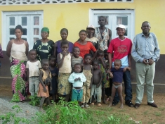 Pastor Jacques Bakulu (right) visiting Mwanza Village