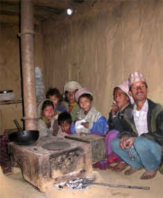 Family with an Electric Light Bulb in rural Nepal. (Alex Zahnd)