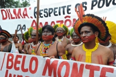 Indigenous people protesting the Belo Monte dam project on Wednesday as the Rio+20 conference opened in Brazil. They say the dam will destroy their livelihoods along the Xingu River.