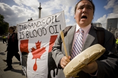 Canadian First Nations and Indigenous Environmental Network representatives campaigning against tar sands mining in Canada at the Camp for Climate Action in London, October 2009.