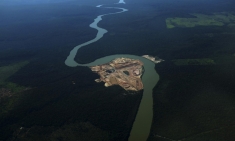 An aerial view of the construction site of a hydroelectric dam on the Teles Pires – a tributary of the Tapajós
