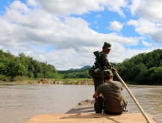  Shan soldiers patrol the Salween River as plans for a series of hydropower projects threaten to swallow up thousands of acres of land, jeopardizing the return of ethnic minority refugees.