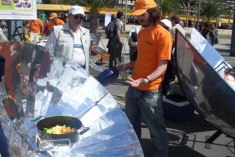 Cooking with a solar stove.