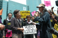 The protest moved to Siam Commerical Bank's headquarters in Bangkok