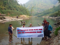 Local citizens gathered during the March 14, 2013 International Day of Action for Rivers on the Barak River in India to protest construction of the Tipaimukh Dam.