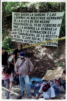 A sign hangs at Xococ, the site of the massacre of hundreds of Maya Achi people who were killed for defending their land against the Chixoy Dam.