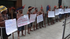 Munduruku indigenous people protested at the Attorney General's office in Brasília on Dec. 10, 2013 for International Human Rights Day.
