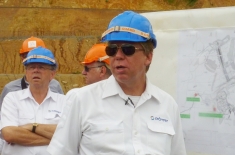 An employee of Poyry presents to a visiting government delegation in July 2012.