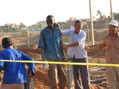Sudanese and Chinese workers in a construction project near Khartoum