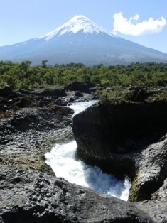 The Osorno volcano and a river near Puerto Varas, Chile.