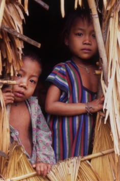 Young children in a house on the Nakai Plateau which was inundated by the Nam Theun 2 Dam.