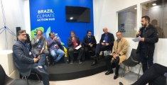 Márcio Astini of Greenpeace Brazil presenting joint CSO declaration to members of the Brazilian Congress at COP 25 in Madrid