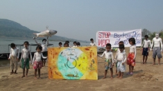 Day of Action in Tamui Village, Thailand, 2013. These kids are protesting the Ban Kum Dam, proposed for the Mekong River mainstream. The dam is located in Laos, but very close to the Thai border.