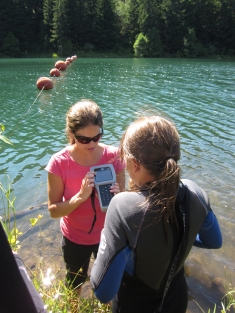 Columbia Riverkeeper's Water Quality Director, Lori Epstein teaches a student how to use a YSI meter, which measures dissolved oxygen.