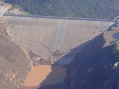 Severe damage at the base of the Compos Novos Dam